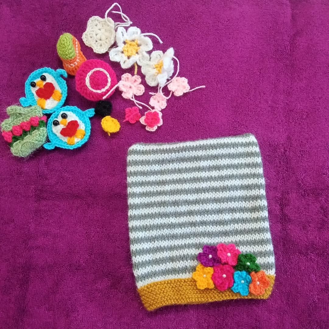 Hand Knitted Woollen Baby Cap with Crochet Flowers