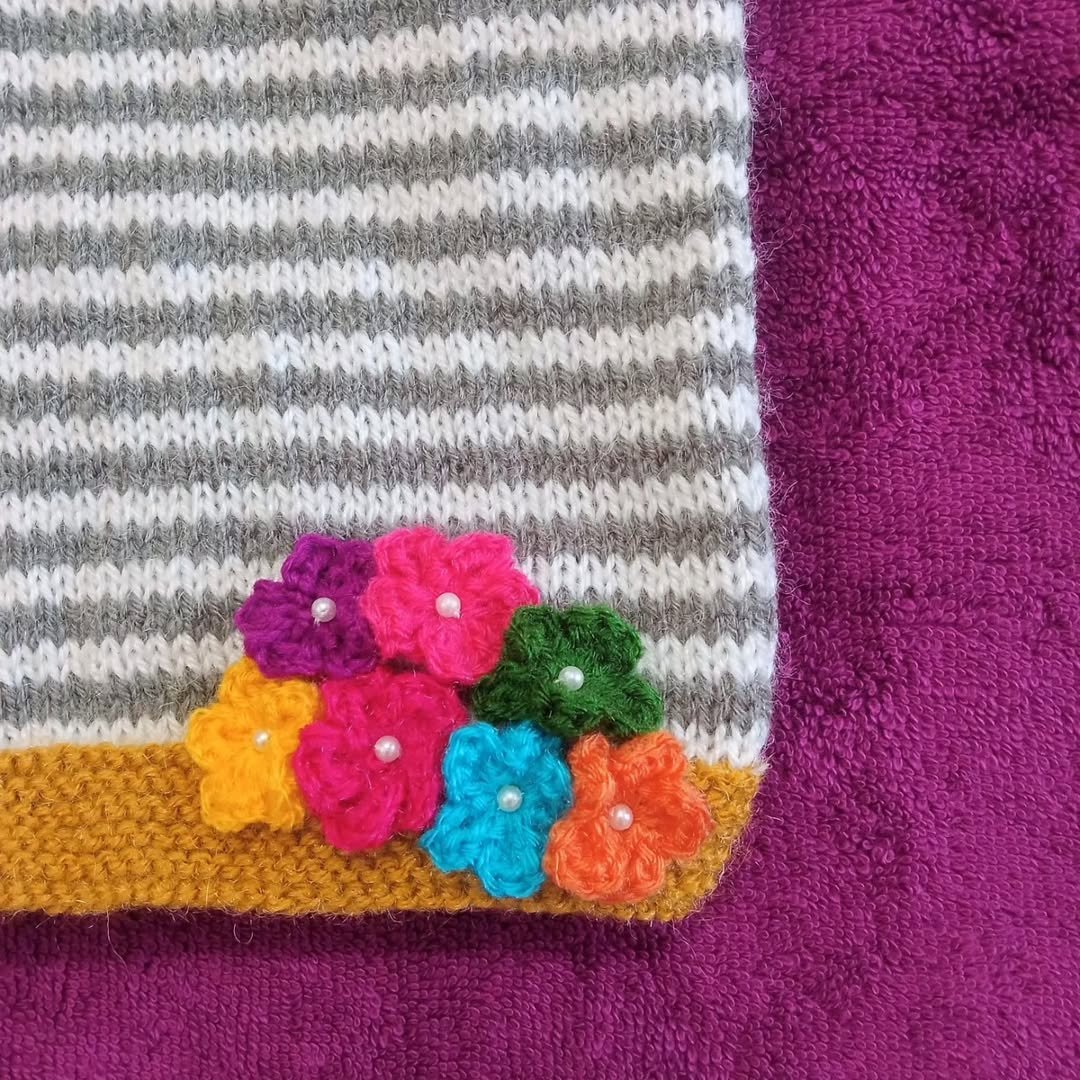 Hand Knitted Woollen Baby Cap with Crochet Flowers